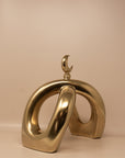 Crescent Knot Sculpture: Rustic Gold